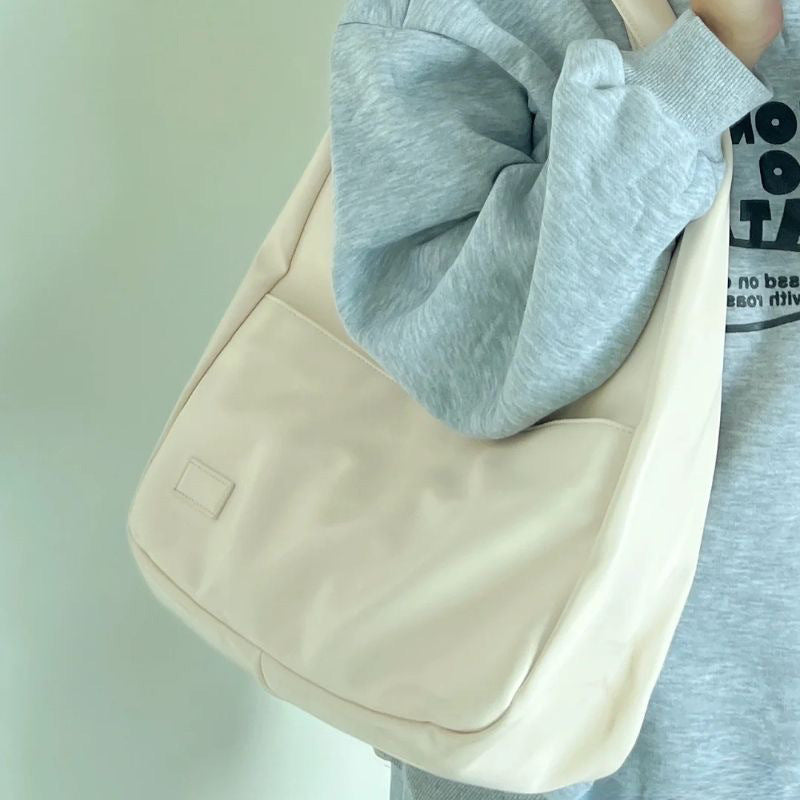 Soft leather tote bag Large capacity brown bucket bag Versatile commuting shoulder bag for women